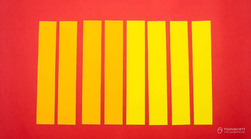 ตัวอย่างกระดาษสีส้มและสีเหลืองที่ตัดแล้ว
